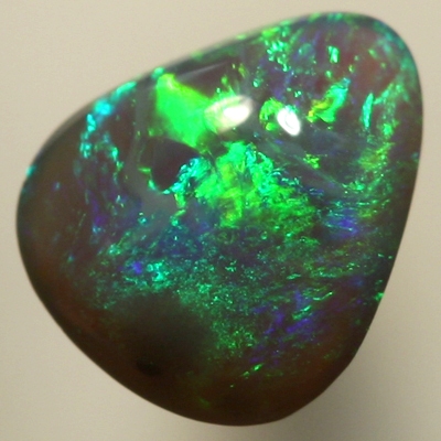 SOLID SEMI BLACK OPAL Sparkles of green and turquoise over a high dome